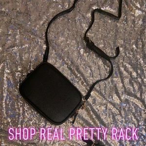 Faux leather cross body bags